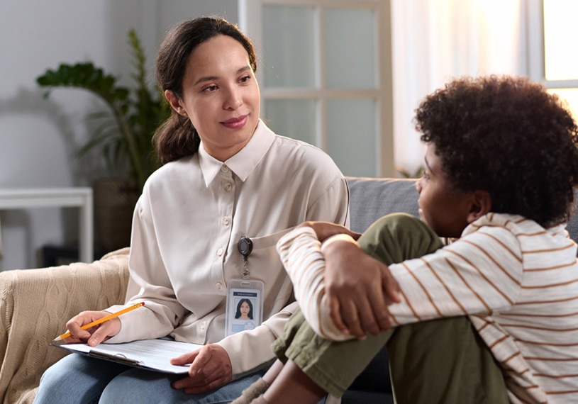 Therapist Talking to Young Boy