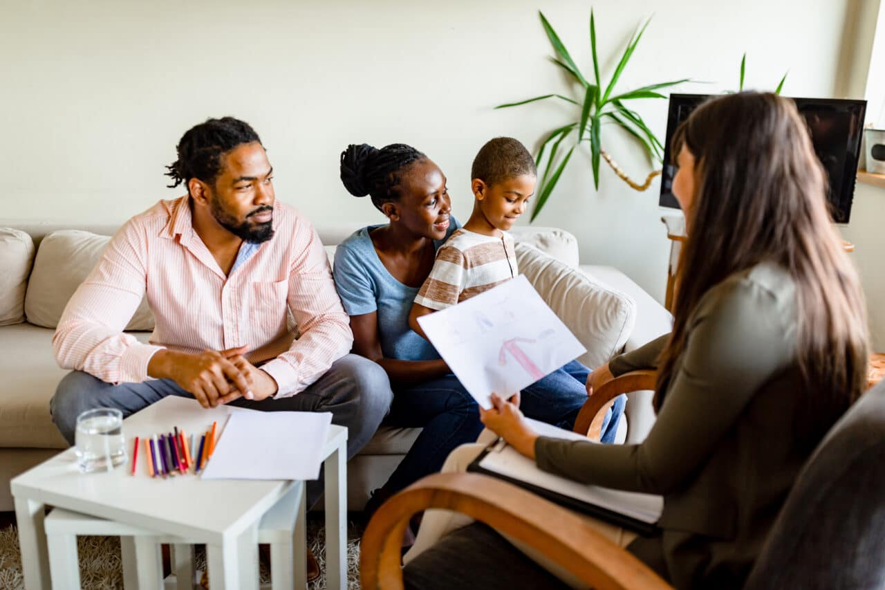 Adoptive/Foster family meeting with counselor.